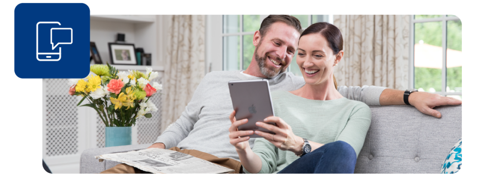 Couple reviews their PTPHomeManual using a tablet